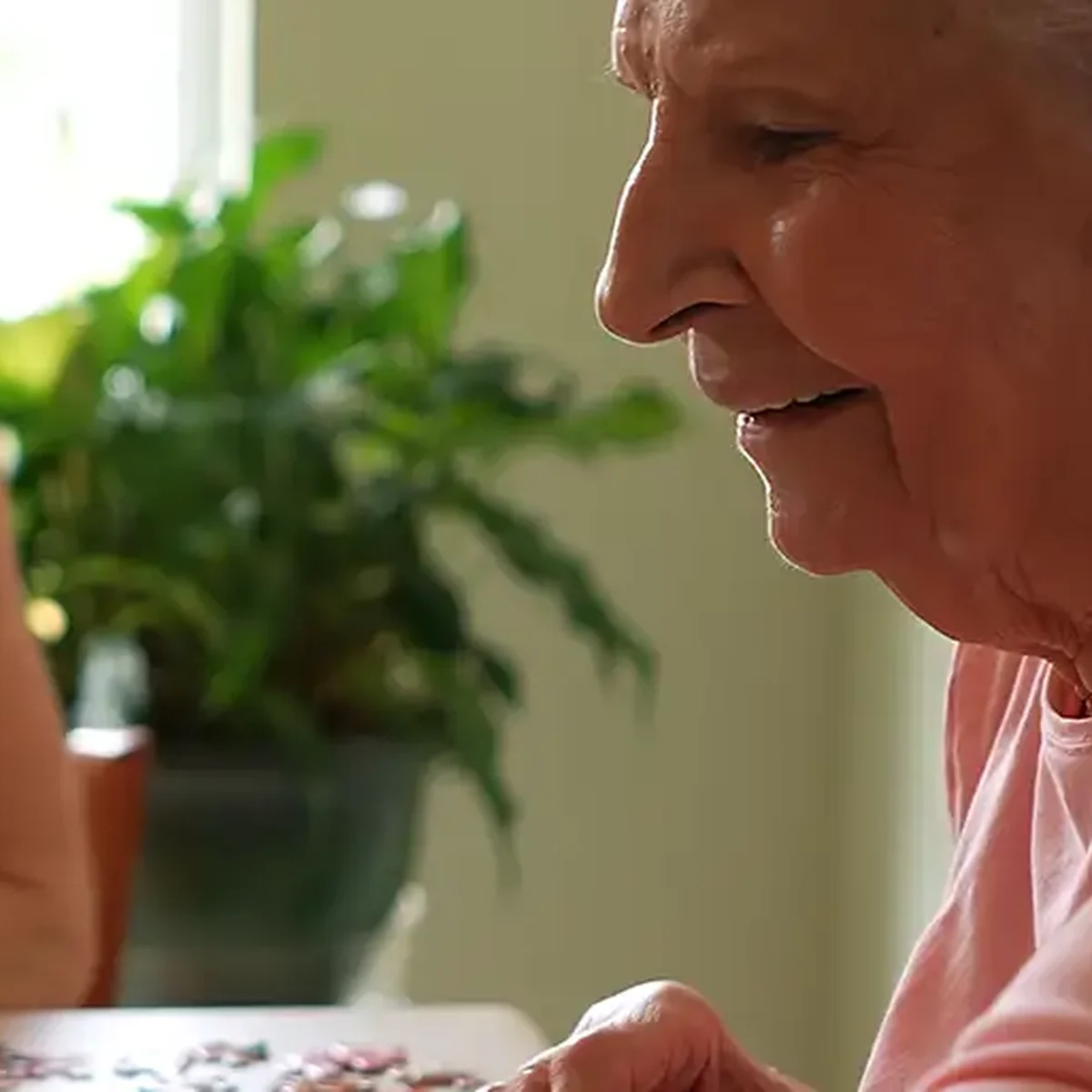 Assisted living residents enjoying a social activity together